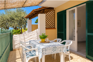 Terrace with entrance in one of the two bedrooms. Apartment La vigna at Villa Olivia Residence , Ischia