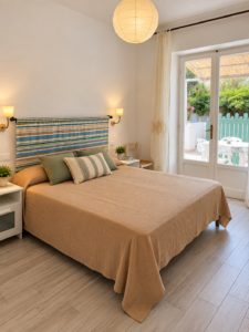 Accesso diretto alla terrazza per la camera da letto matrimoniale, bilocale La Vigna nel Villa Olivia Residence Ischia